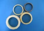 DTCA-0056 F     used plastic couplings for 2 inch glass pipe. One comes with a gasket, both come with friction rings