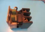 used GE plastic contactor with a metal mounting base
