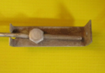 sink stopper on a rod with a screw-adjustable bracket