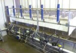 Twelve (12) DeLaval claws for goats, with shells, milk meters, and pulsators