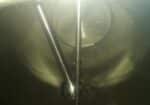 Used Surge 1250 Gal Tank INSIDE view with agitator